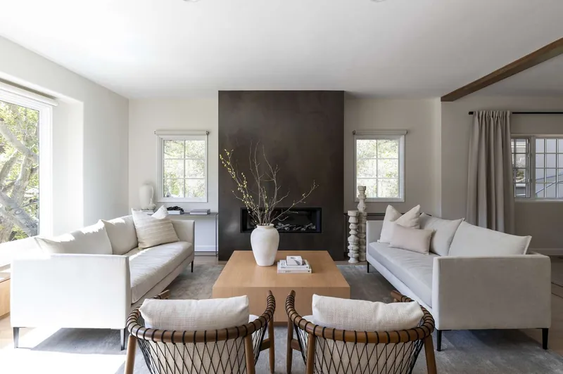 Clean, organized living space with minimal décor and natural light